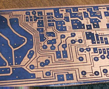 PCB after removing enough paper; ready for etching!